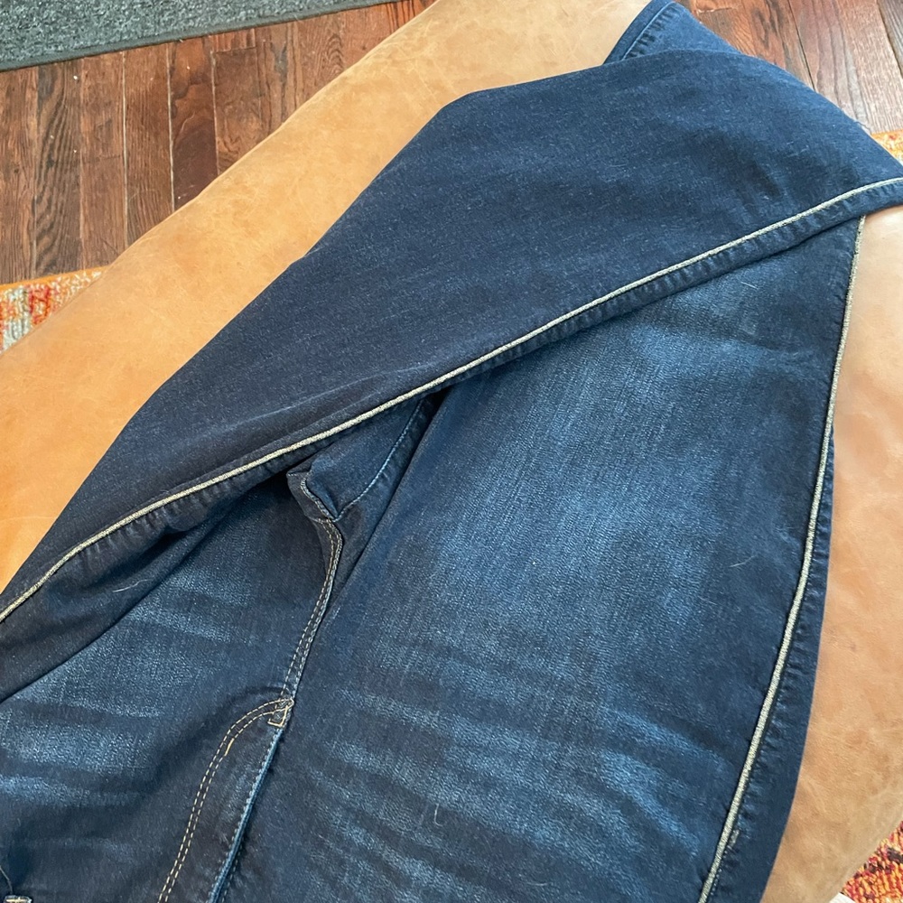 Democracy jeans with gold narrow edge going down outside seam!